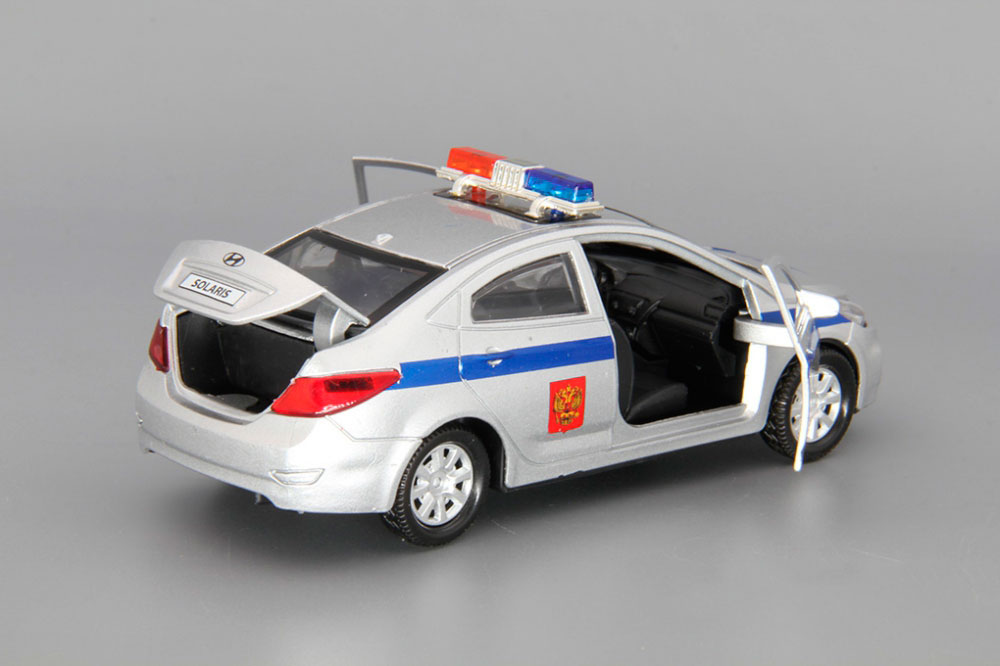 Машина металлическая Hyundai Solaris Полиция 12 см, открываются двери и багажник, инерционная  
